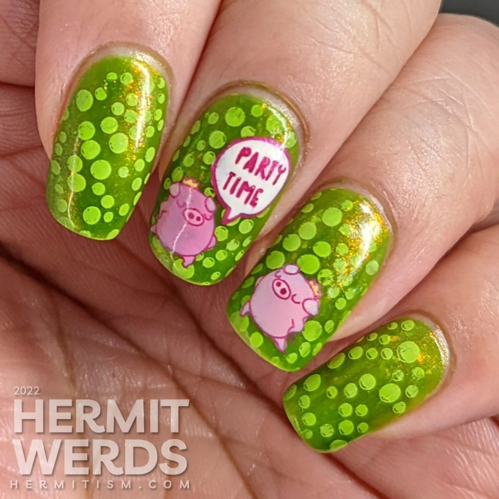 A polka dot pig nail art with party pig reverse stamping decals and polka dots tucked between layers of a bright green jelly polish.