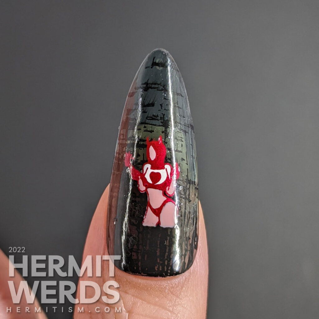 An anti-Valentine yet Halloween gothic nail art with a heart-stealing demon lady and anatomical heart cupcake and gothic reflective glitter.