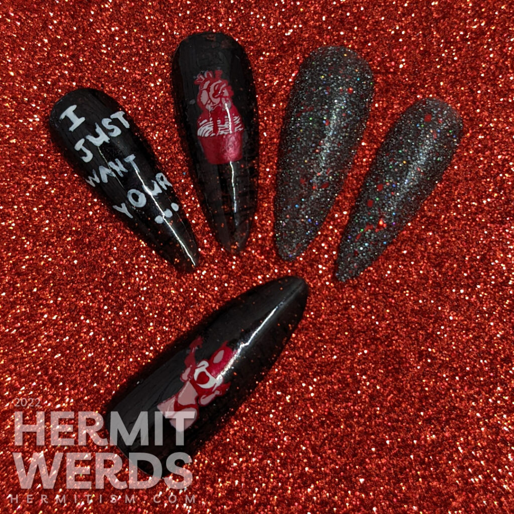 An anti-Valentine yet Halloween gothic nail art with a heart-stealing demon lady and anatomical heart cupcake and gothic reflective glitter.