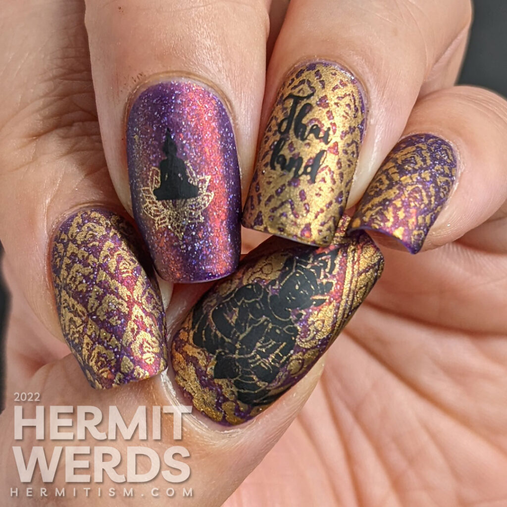 A brocade-like Thailand nail art featuring Buddah meditating over a lotus blossom + a Thai flame fabric pattern over a flakie purple polish.