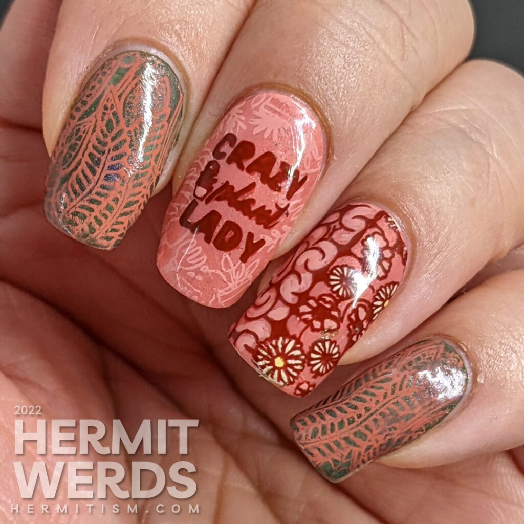 A salmon pink and green gardening nail art for people with plants on the brain. Actual brain and flower reverse stamping decals.