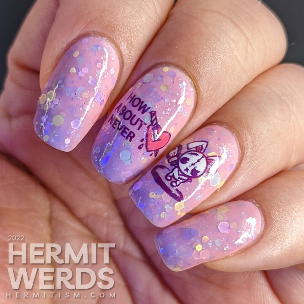 An anti-Valentine/Easter/Halloween pink/purple solar crelly mani with emo bunny stamping decals wielding indifference and a chainsaw/knife.