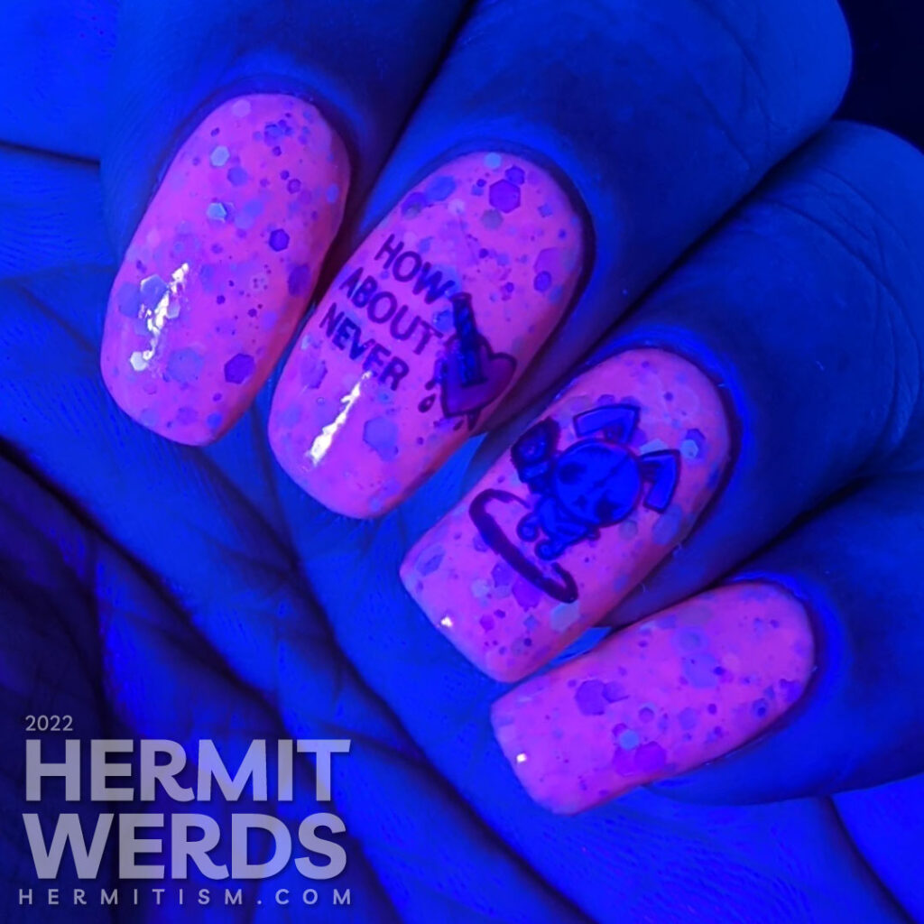 An anti-Valentine/Easter/Halloween pink/purple solar crelly mani with emo bunny stamping decals wielding indifference and a chainsaw/knife.