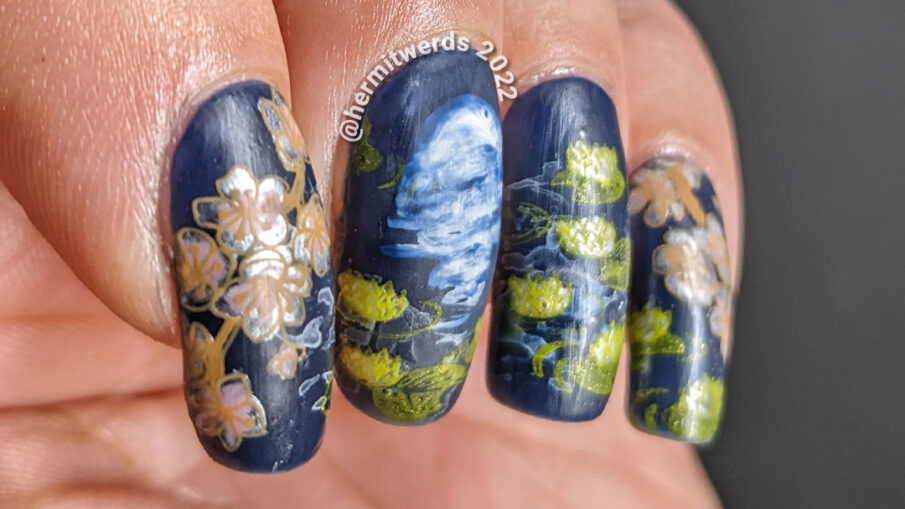 A smoky blue lily pond mani with the reflection of the flower moon shining forth, spring cherry blossom stamping decals, and koi.