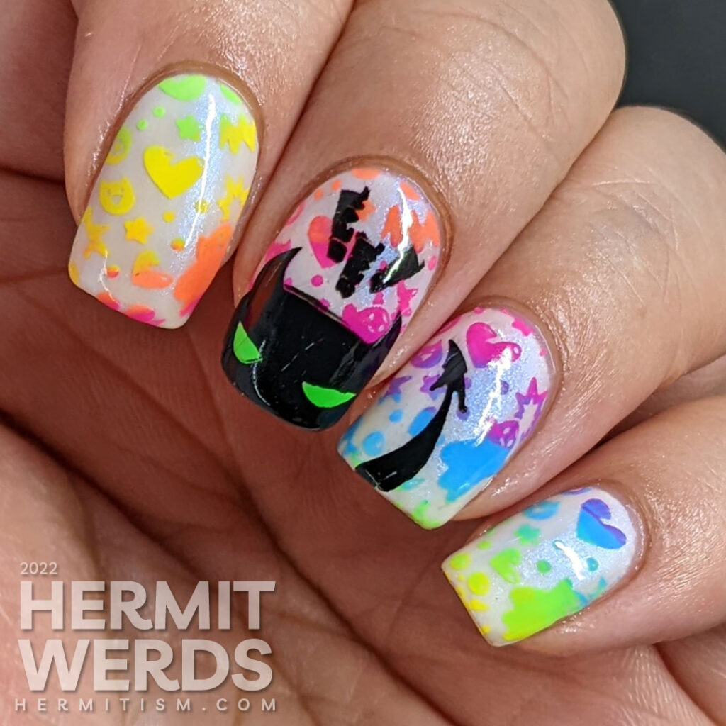 A kawaii Halloween / devil nail art with a neon rainbow gradient background stamp and plump demon stamping decal with green eyes.
