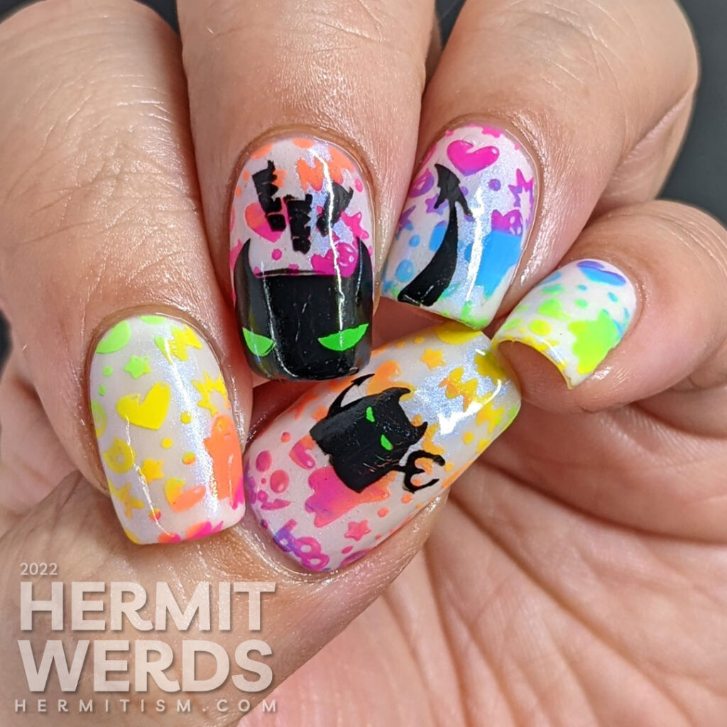 A kawaii Halloween / devil nail art with a neon rainbow gradient background stamp and plump demon stamping decal with green eyes.