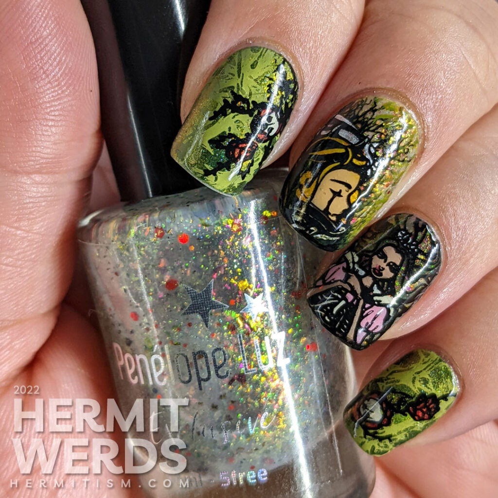 A glitzy Sleeping Beauty nail art with stamping decals of a castle buried in thorns, thorns, lady knight, and the princess (aurora).