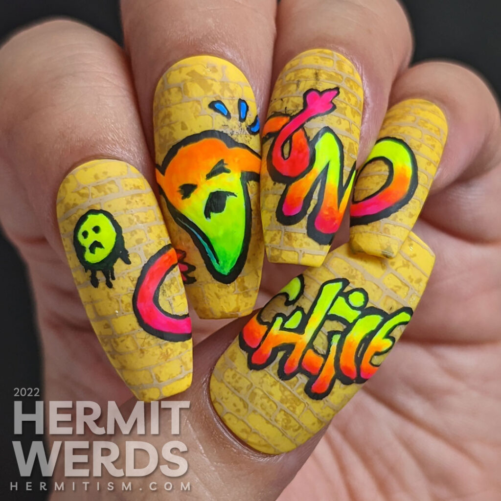 Graffiti nail art protesting Roe vs Wade being overturned with a neon freehand painted uterus flipping the fimbriae + "No Choice".