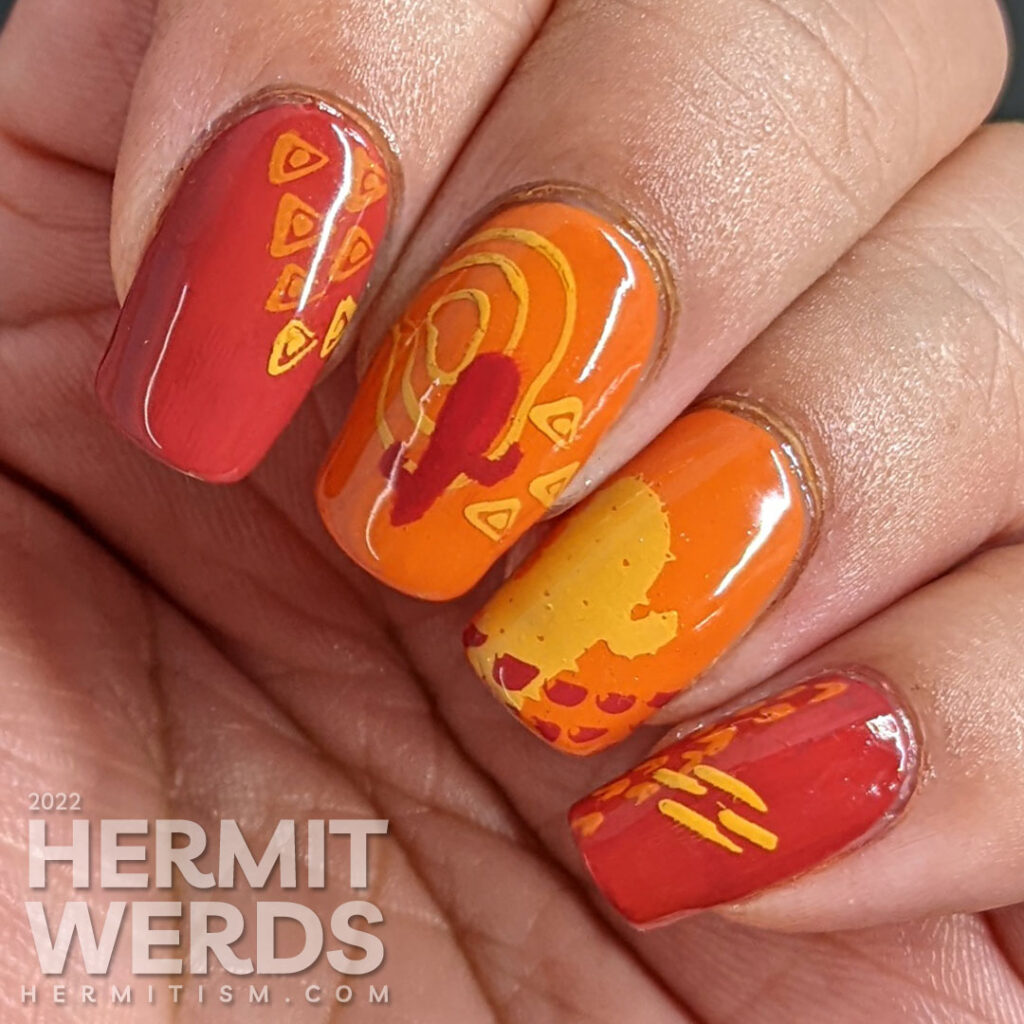 A modern red, orange, and yellow (mustard) cactus nail art combined with abstract shapes to create a fun minimalist look.