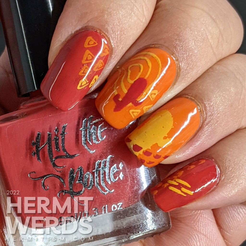 A modern red, orange, and yellow (mustard) cactus nail art combined with abstract shapes to create a fun minimalist look.