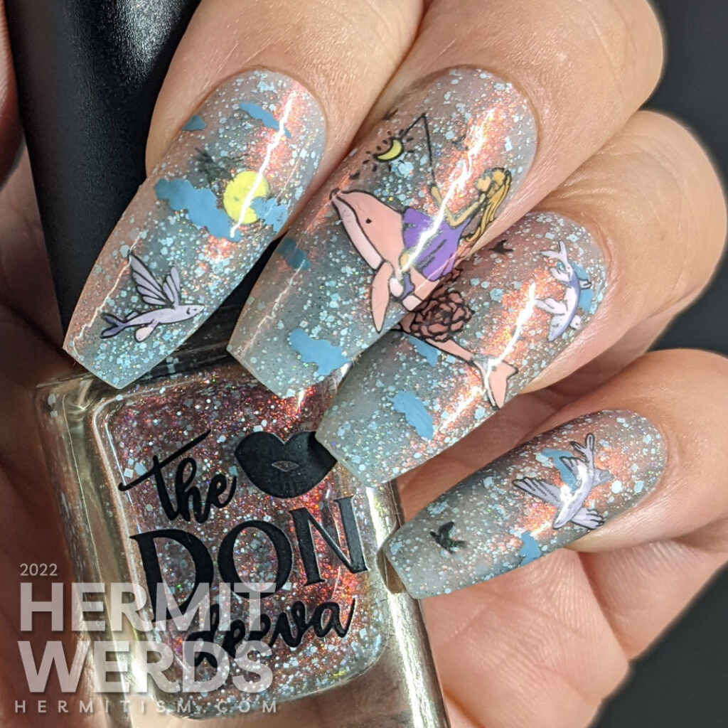 Sturgeon Moon nail art with flying fish and a pink dolphin guided by a girl on a magical journey across a shifty pink and grey sky.