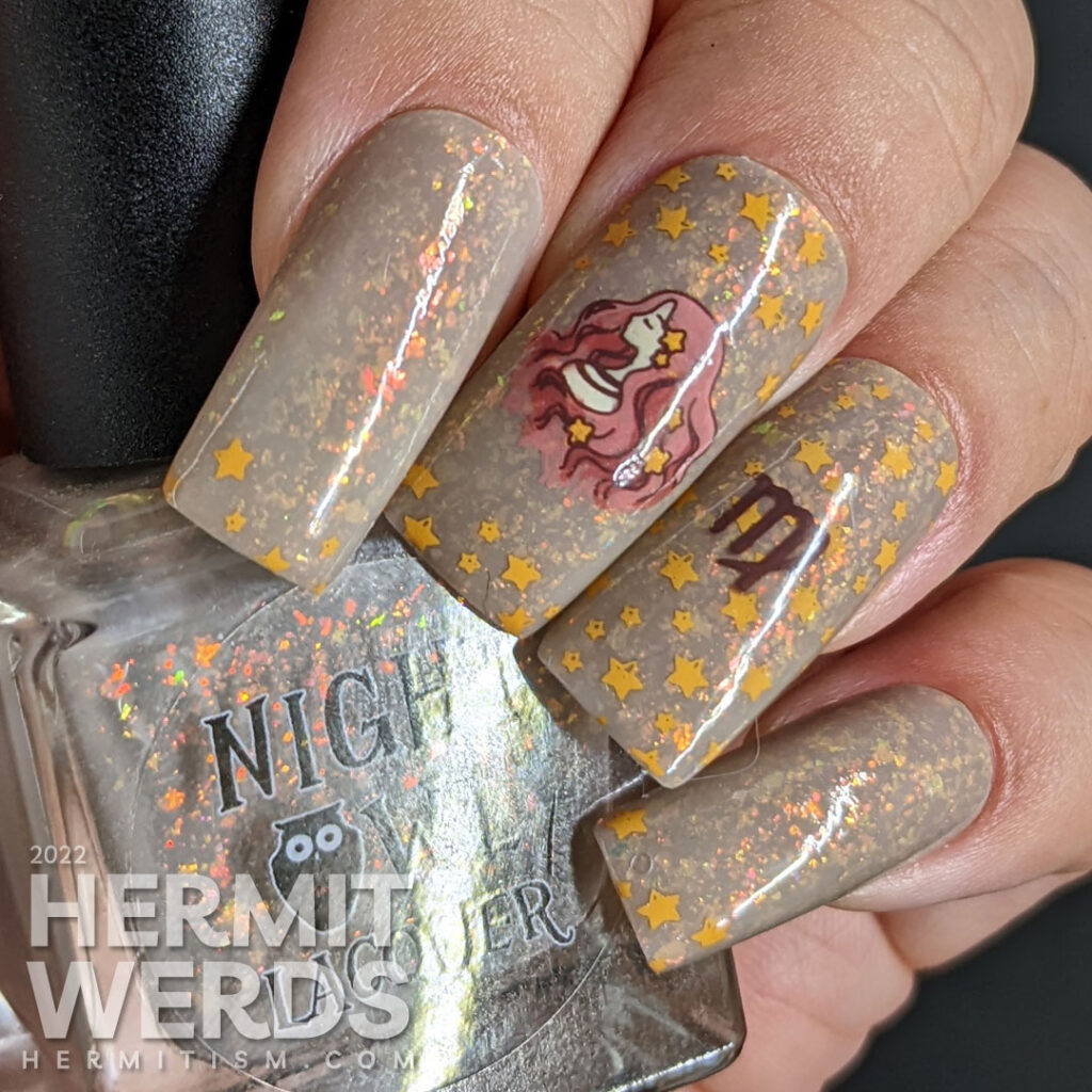 Virgo nail art starting with a greige crelly base polish and nail stamping of tiny yellow stars, a Virgo girl, and a winged planet Mercury.