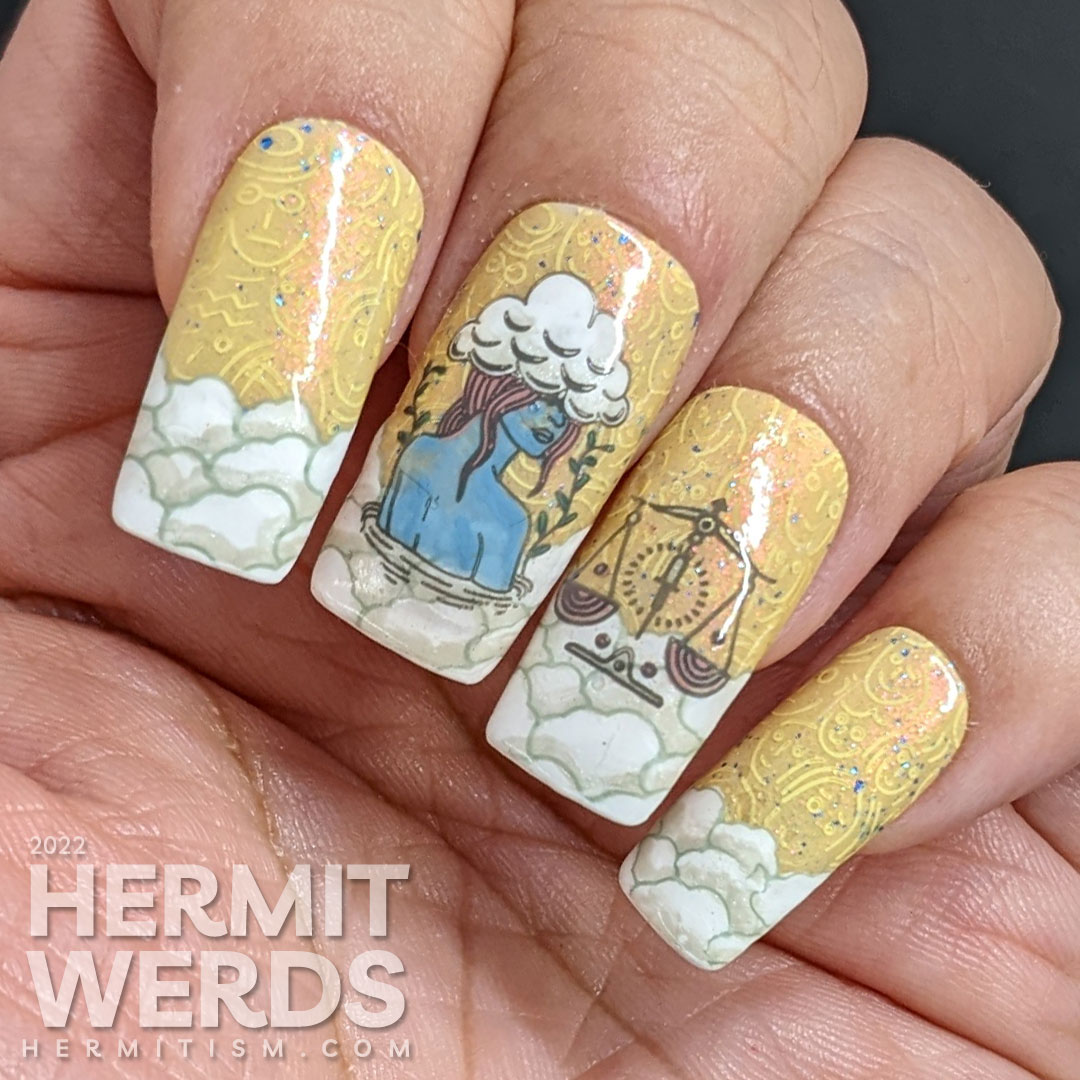 Libra nail art with a yellow sky and stamping decals of abstract faces, a lady with her head in the clouds, more clouds, and Libra scales.