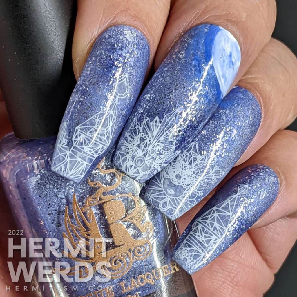 A periwinkle frost moon nail art for the full moon in November with a frosty ice castle stamped underneath.