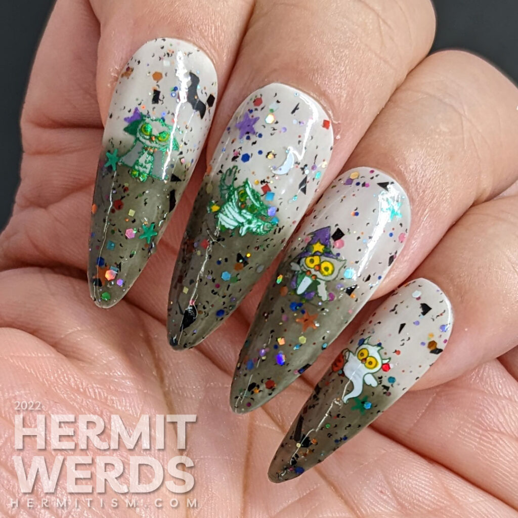 Cute owls dressed up in costumes--ghost/vampire/mummy/witch/skeleton--stamped onto a white/black thermal polish with Halloween glitter.