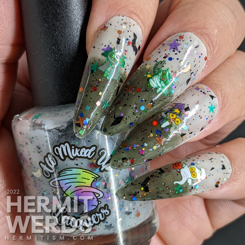 Cute owls dressed up in costumes--ghost/vampire/mummy/witch/skeleton--stamped onto a white/black thermal polish with Halloween glitter.