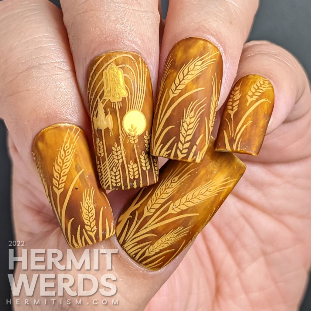 A super spicy mustard nail art for the Harvest Moon featuring stamping images of wheat grain and rockets flying past the moon.