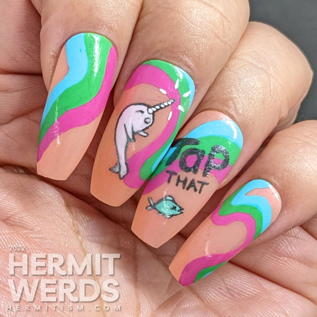 Narwhale nail art with rainbow swirls on a peach background and a freehand painted narwhale painted on top "Tap that fish!".