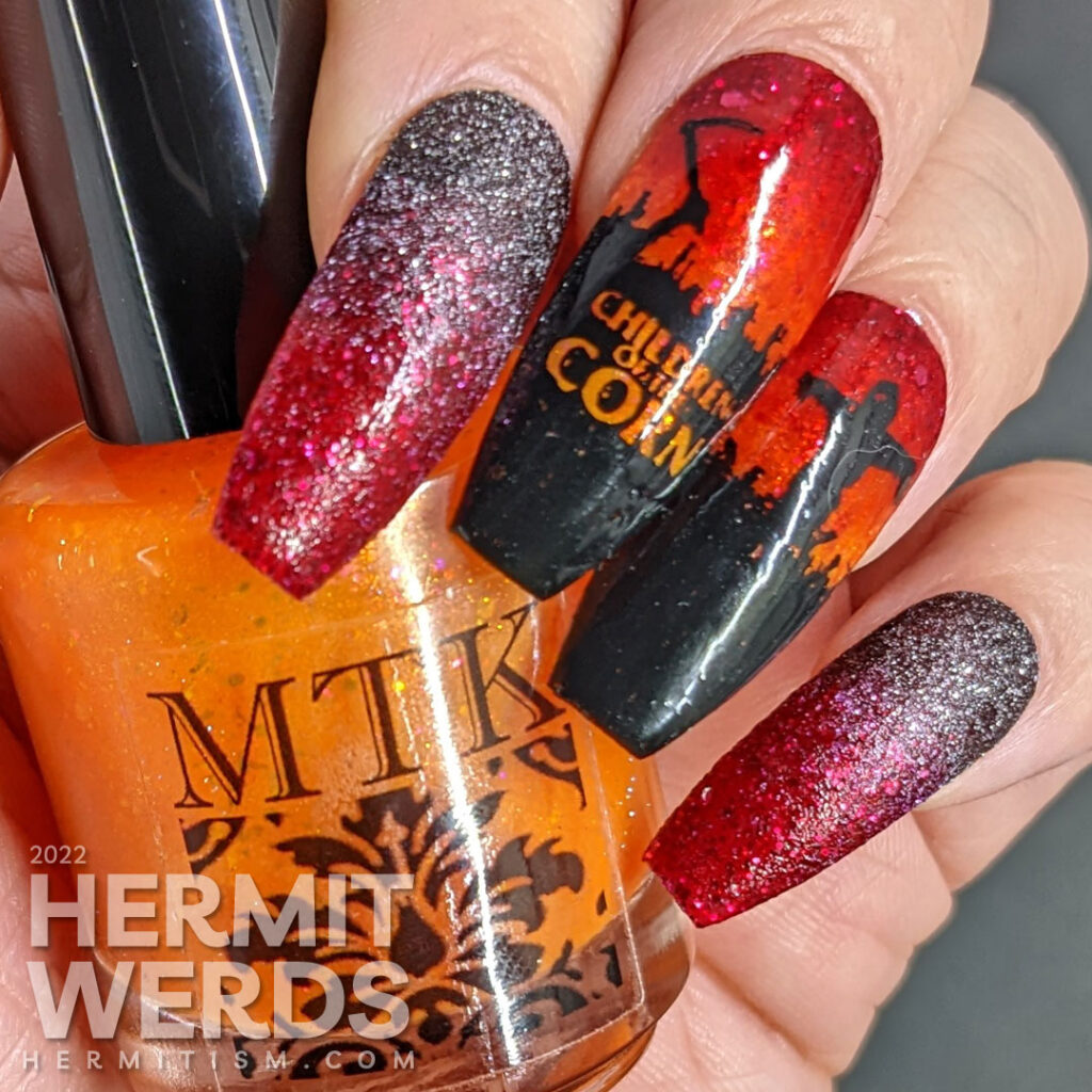 A Halloween mani based on the Children of the Corn book (and movie) by Stephen King with a gradient from black to red to orange.