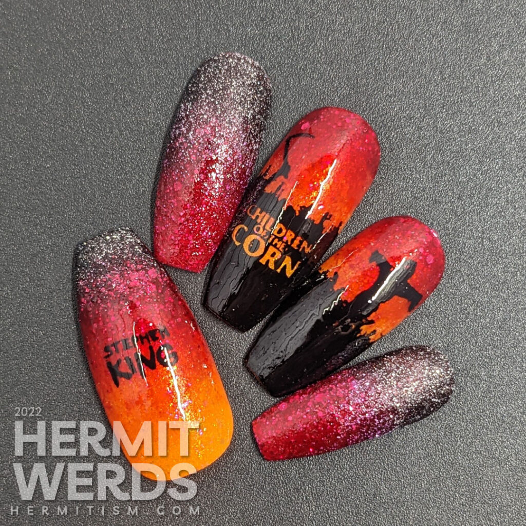 A Halloween mani based on the Children of the Corn book (and movie) by Stephen King with a gradient from black to red to orange.
