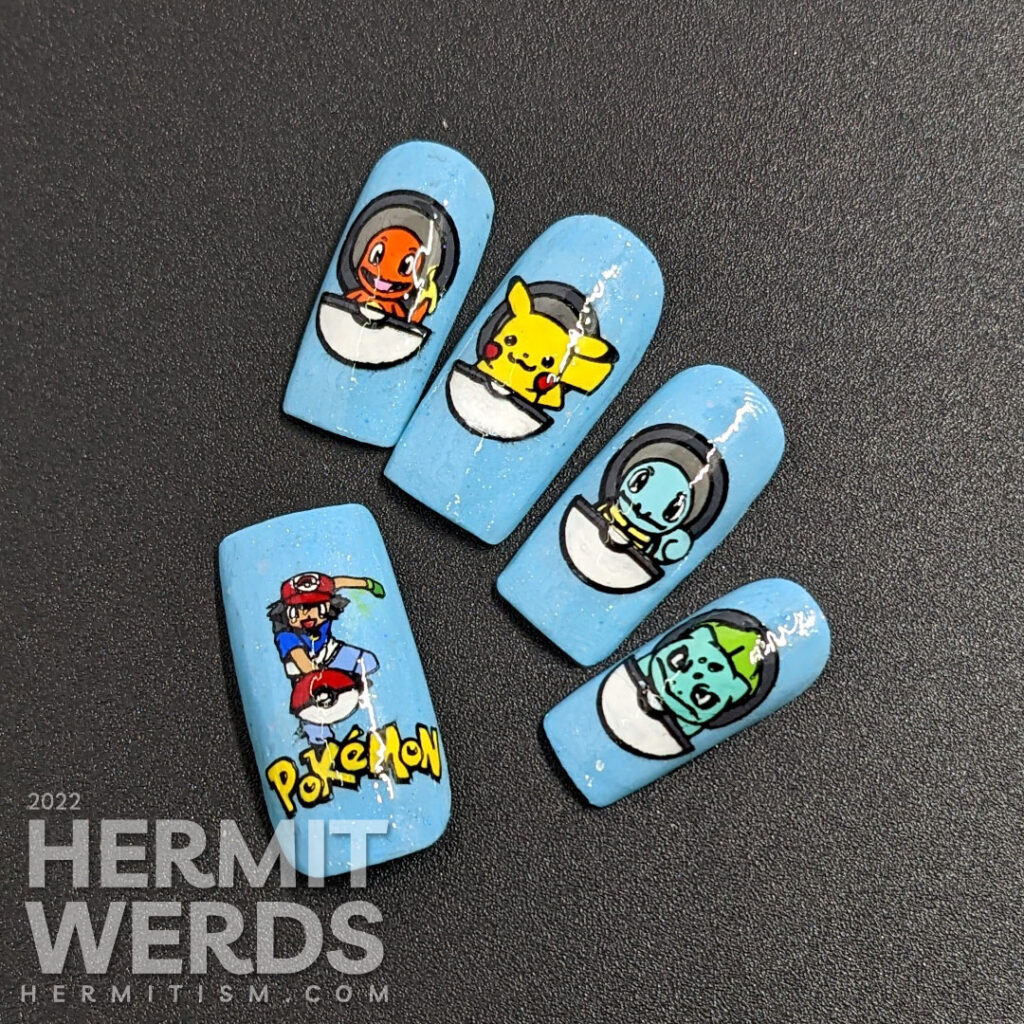 Pokémon nail art with open pokeballs containing Charizard, Pikachu, Squirtle, and Bulbasaur and trainer Ash Ketchum himself on the thumb.