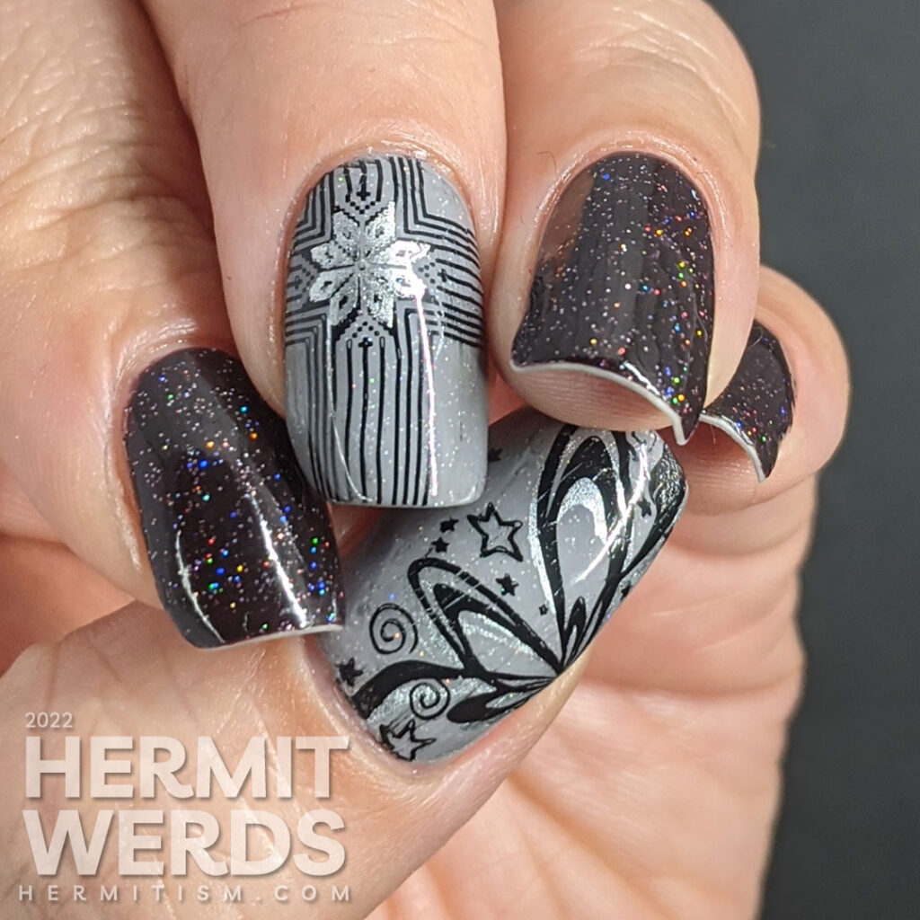 A grey, black, and silver glitzy gift mani for Christmas with double stamped giant bows and ribbons and holographic glitter sparkling away.