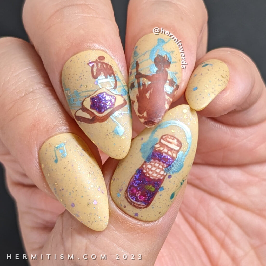 A toasty nail design that combines stamping decals of jamming out to rock music and jam on toast for January.