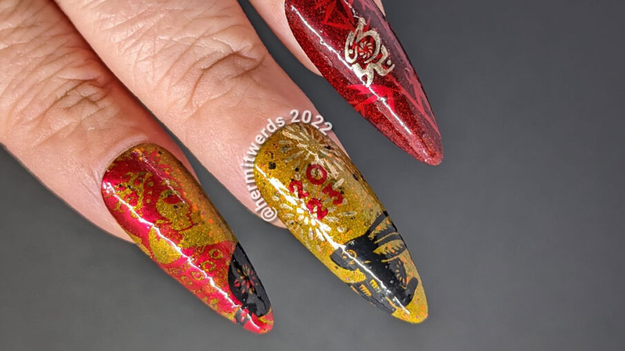 Chinese New Year nail art for the Year of the Rabbit with holographic red, deep mustard, gold, and black polish + rabbit cutouts and bamboo.