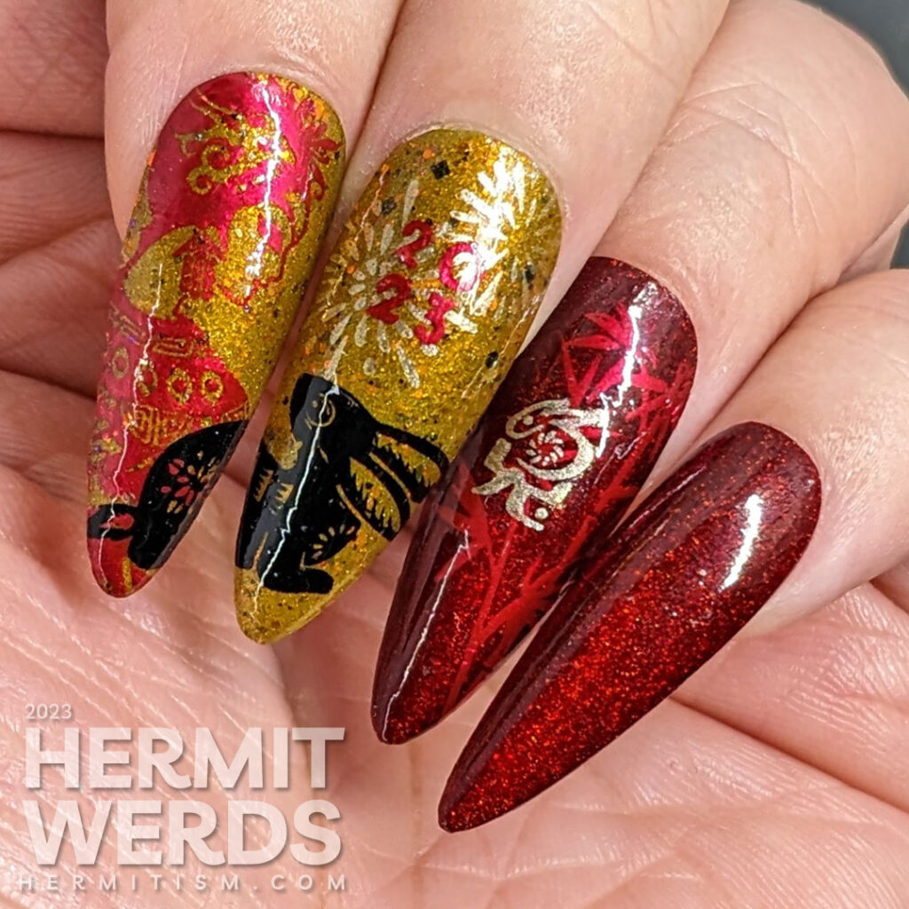 Chinese New Year nail art for the Year of the Rabbit with holographic red, deep mustard, gold, and black polish + rabbit cutouts and bamboo.