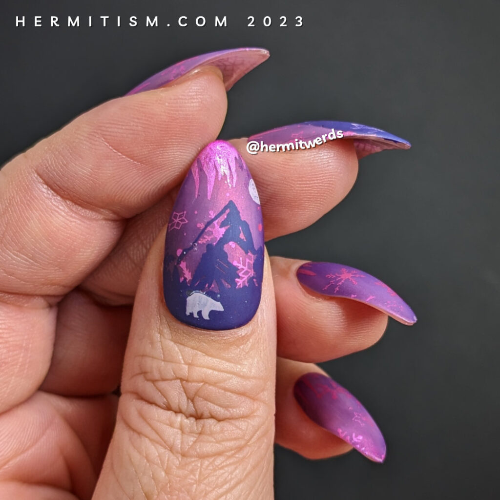 Bear Moon nail art to celebrate the full moon in February on a gorgeous magenta nail polish and snowflakes and icicles in the background.
