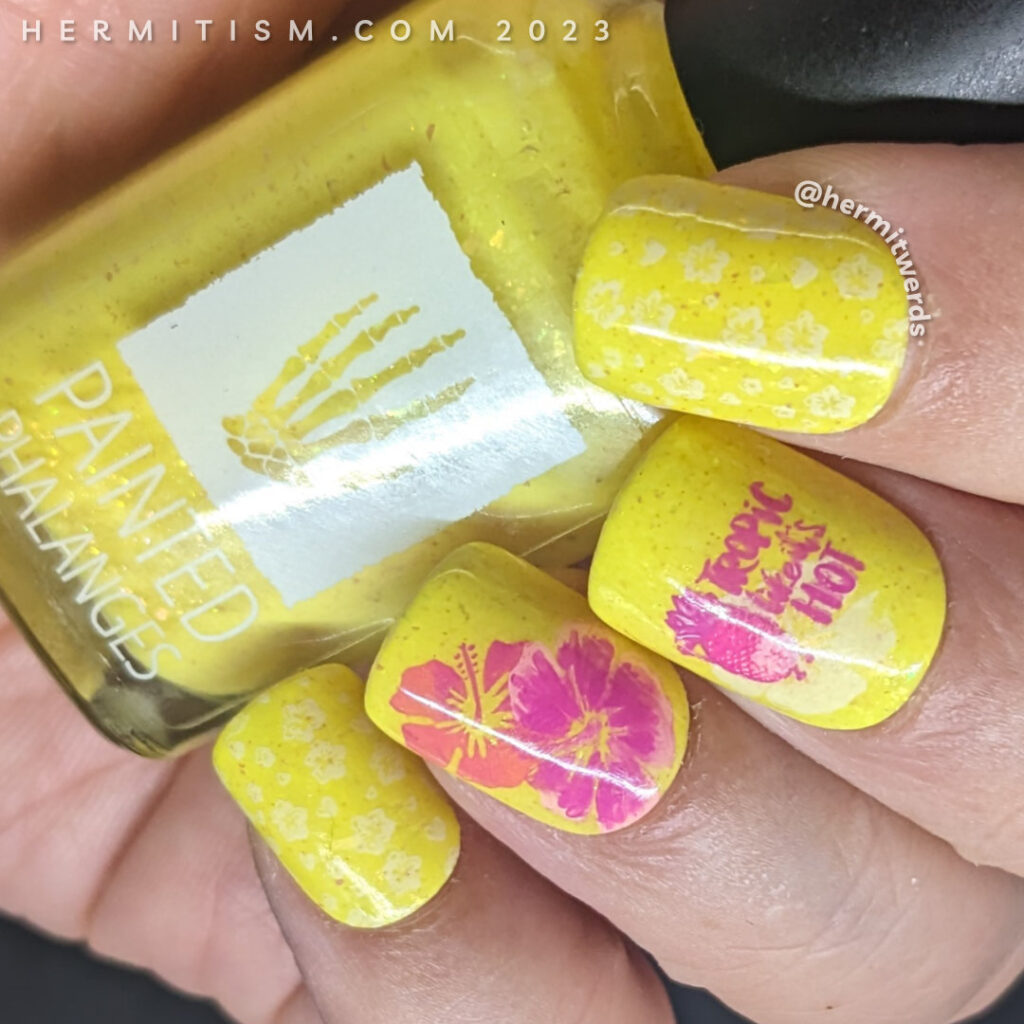 A bright yellow hibiscus and pineapple nail art with a "sexy" censored pineapple stamping decal to make it tropically funny.