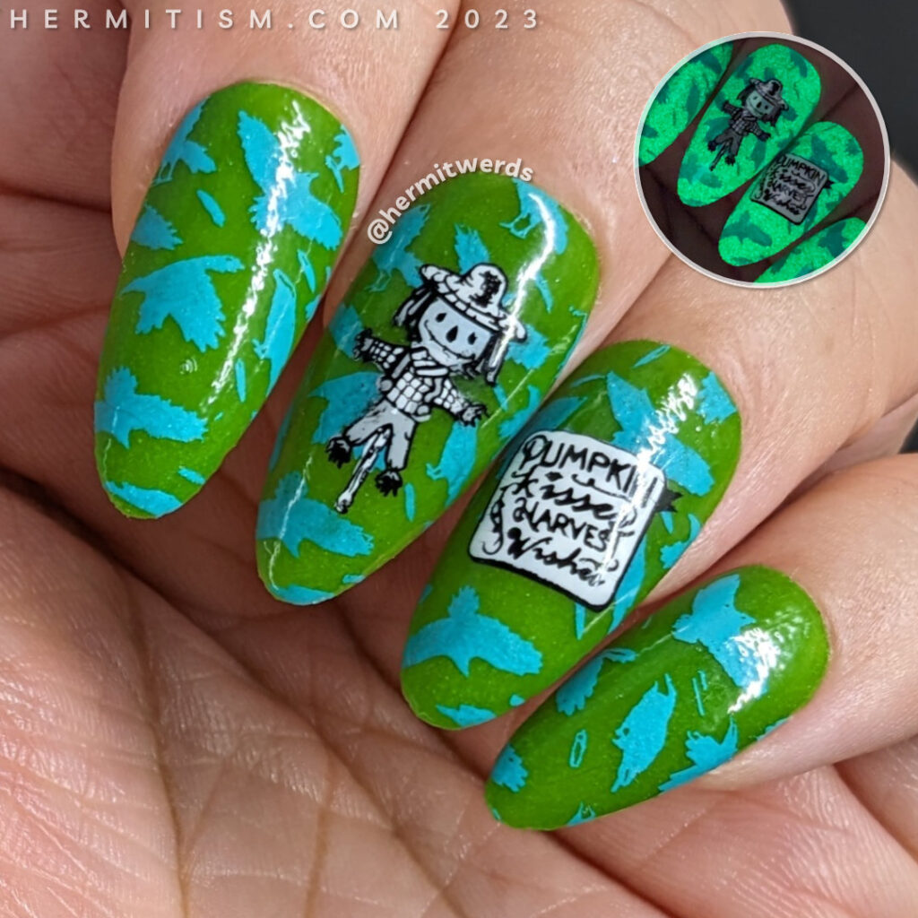 Scarecrow nail art with a bright blue & green background of flapping crows with cute black and white scarecrows stamped on top.