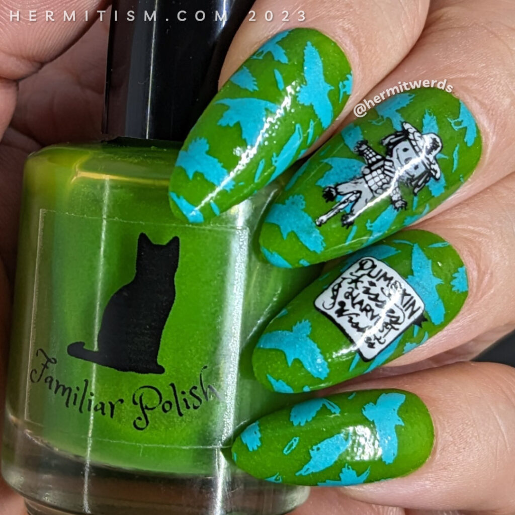 Scarecrow nail art with a bright blue & green background of flapping crows with cute black and white scarecrows stamped on top.