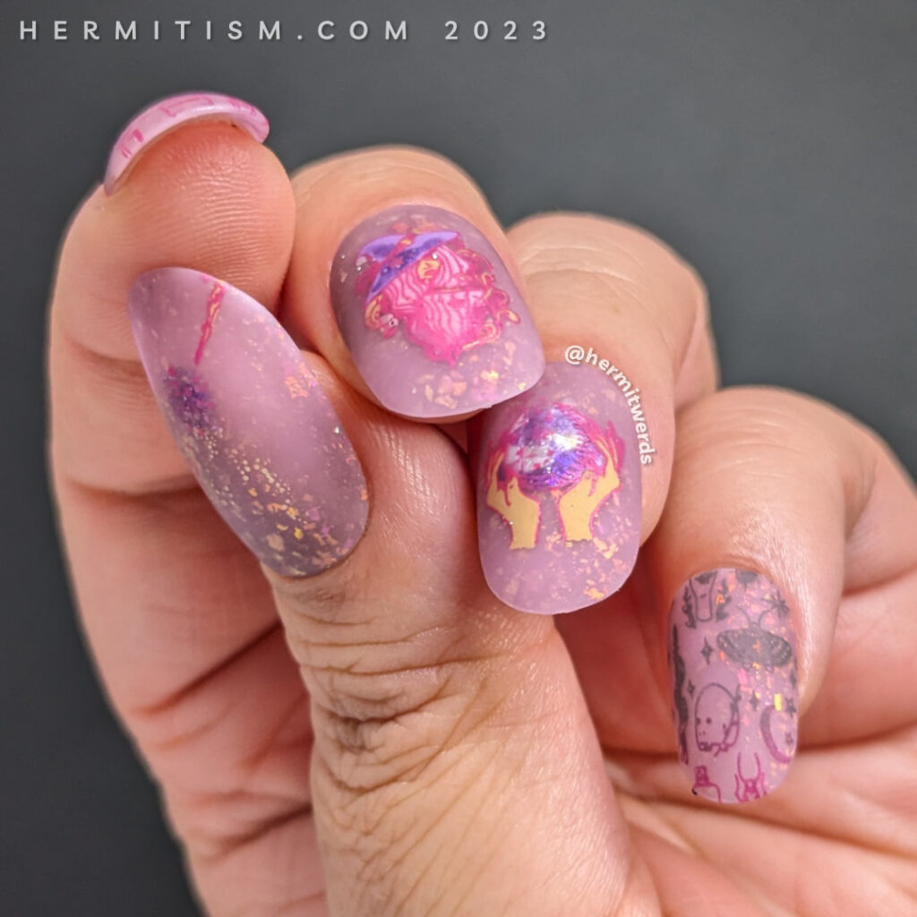 A practicing witch/wizard nail art with decals of potions, wands, crystal balls, etc. on a thermal brown to lilac flakie filled polish.