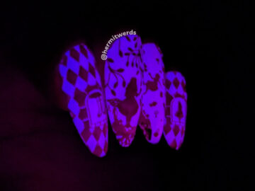 A glow in the dark pink Alice in Wonderland nail art of Alice falling down the rabbit hole, chasing the White Rabbit, and changing size.