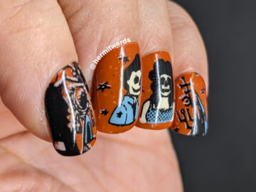 A vintage Halloween poster nail art design with rockabilly skeletons and stylized haunted houses in orange, black, grey-blue, and cream.