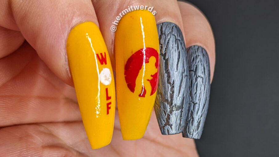 Universal Studio's Wolf Man nail art w/glow in the dark yellow nails, "wolf", full moon, & silhouetted Wolf Man plus crackle polish accents.