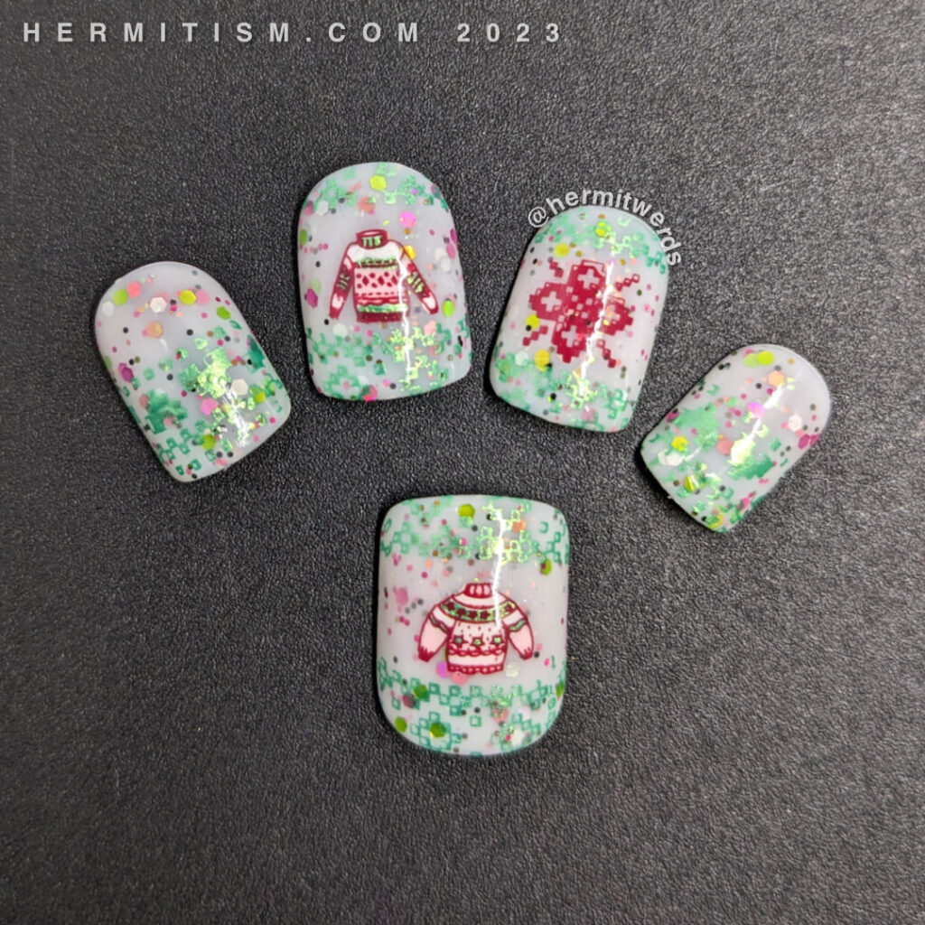 Sweater nail art with cute sweater patterns in red and green on a sweet glittery white crelly and a few sweater decals too. Almost Christmas.