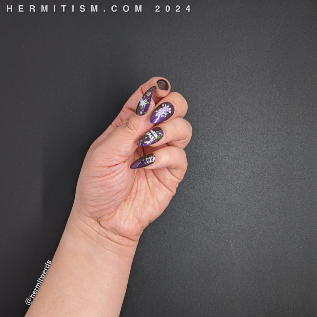 NSFW Mardi Gras nail art in purple, green, and gold featuring images referencing the flashing for Mardi Gras beads tradition.