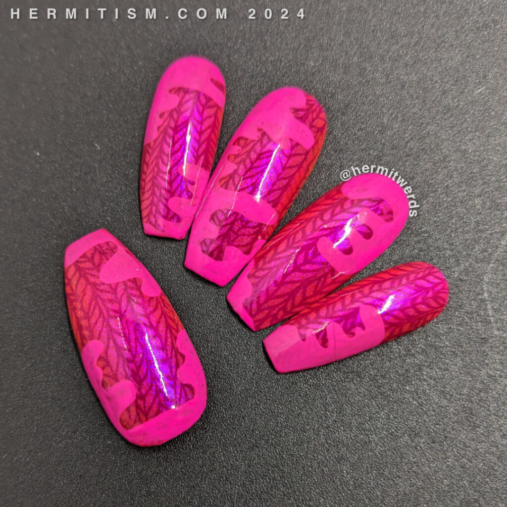 Hot pink nail art with a crazy sweater print and hot pink blobs stamped on top as the background for some Valentine's Day llama nail art.