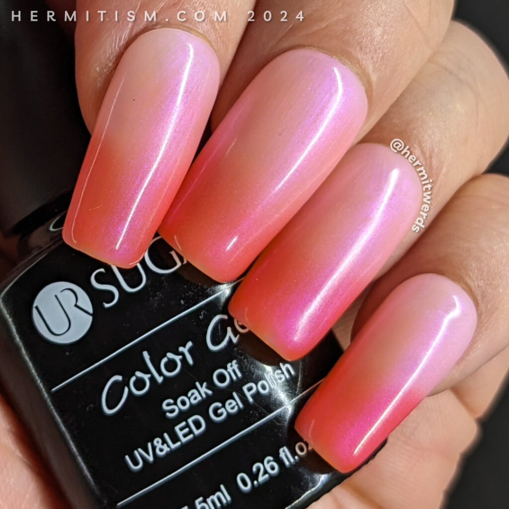 A coral to white gel thermal polish by UR Sugar.