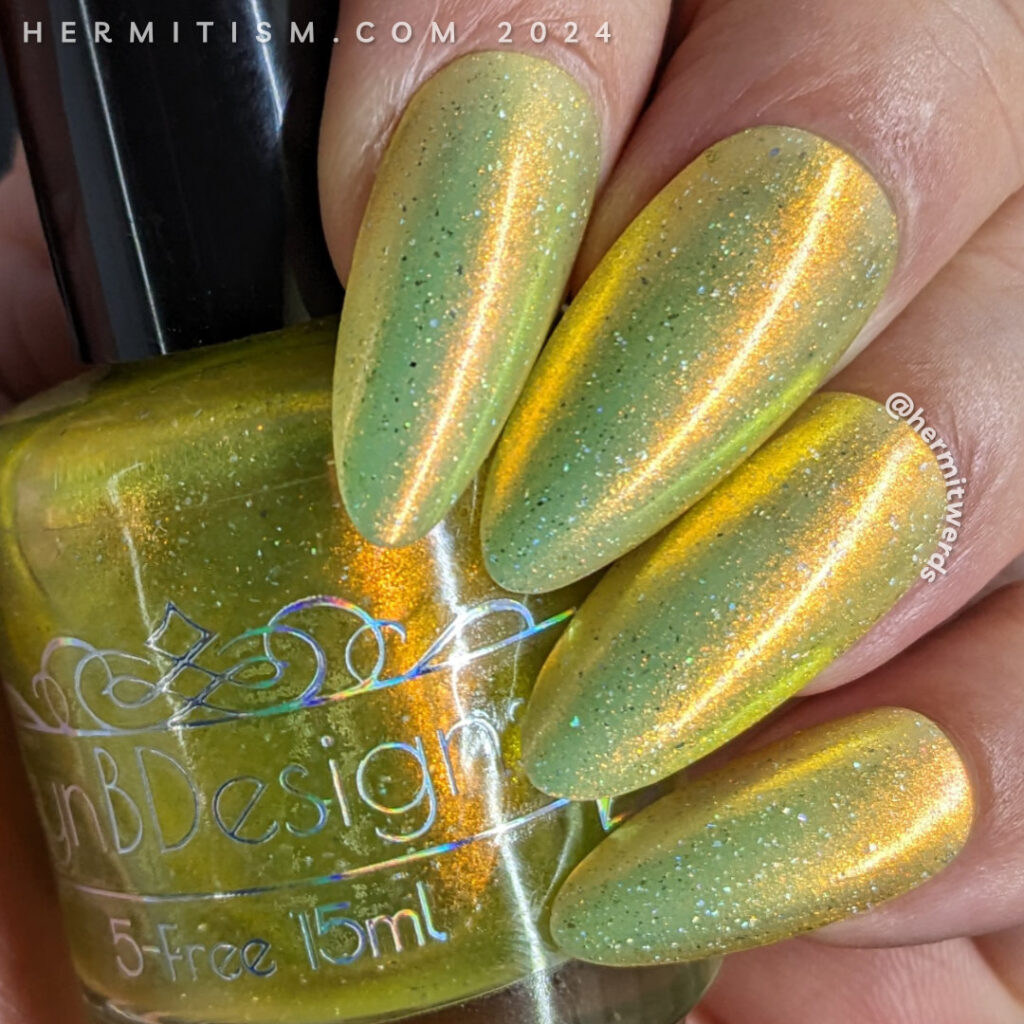 A swatch of a sunny yellow super shifty polish by Lyn B Designs called "The Sun Came Out" for a yellow cherry nail art.