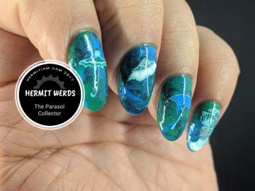 The Parasol Collector - Hermit Werds - a series of parasol decals and a victorian lady on a blue and green smoosh marble