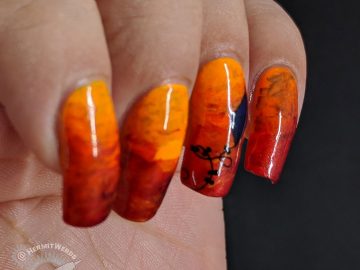 Flying at Sunset - Hermit Werds - tropical orange sunset nail art with the silhouette of a kite against the sky