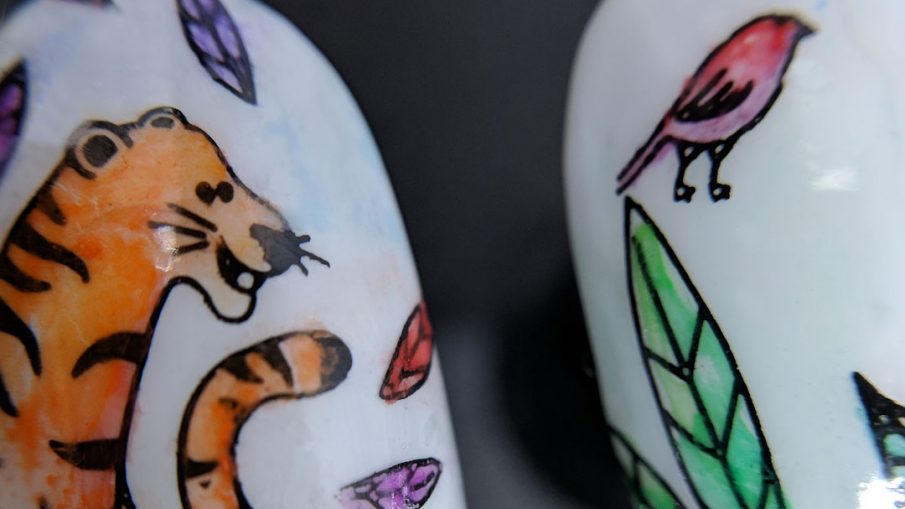 Tiger Munchies - Hermit Werds - nail art of watercolor tiger gazing hungrily at a little bird in the jungle