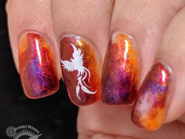 Dance of the Firebird - Hermit Werds - flame-colored duochrome nail art design with a firebird and feathers stamped on top