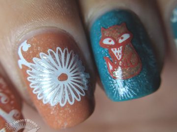 Fox Among Daisies - Hermit Werds - teal and terra cotta nail art with daisies and a fox decals on top