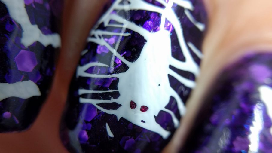 Going Batty - Hermit Werds - purple glitter-filled jelly nails with white bat nail stamping on top