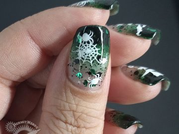 Witch of Spiders - Hermit Werds- dark green baby boomer french tips with black and green glitter and white witch and spider stamping on top