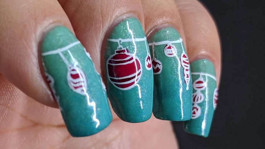 Peppermint Baubles - Hermit Werds - shimmery mint gradient behind nail stamping decals of peppermint-colored Christmas ornaments